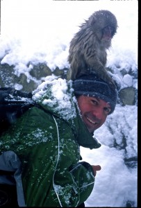 Chris Kratt monkeys around with snow monkeys he met while skiing in Japan